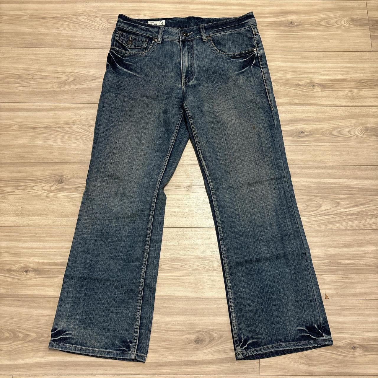 0557 - Y2K Buffalo Embroidered Faded Jeans