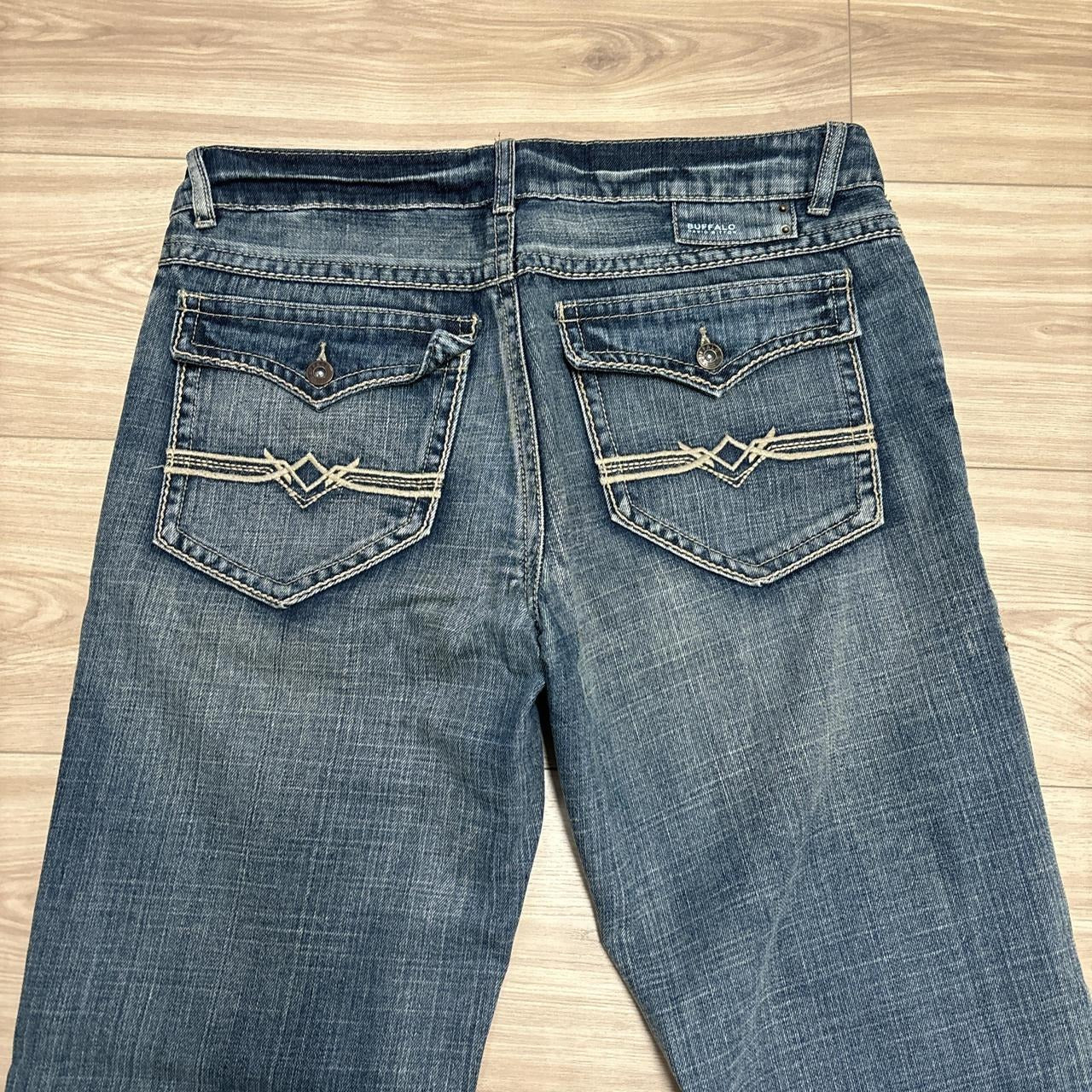 0557 - Y2K Buffalo Embroidered Faded Jeans