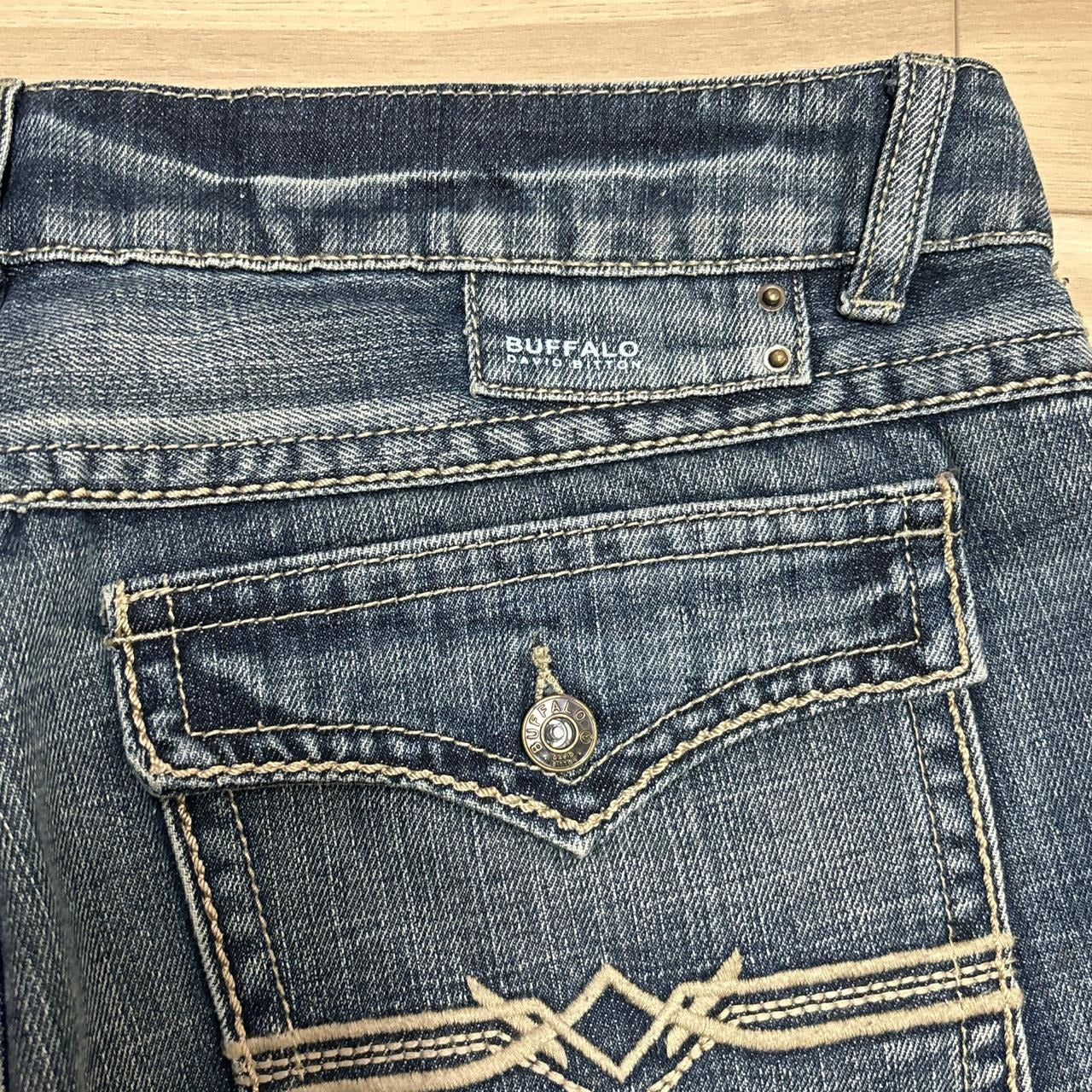 0557 - Y2K Buffalo Embroidered Faded Jeans