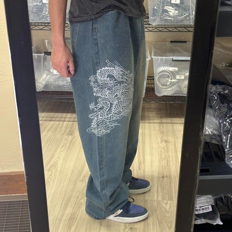 0410 - Baggy Embroidered Dragon Faded Jeans